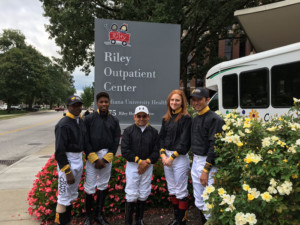 From left, Shanley Jackson, Malcolm Franklin, Eddie Perez, Kaylia Albright and Leandro Goncalves visited with children at Riley Hospital for Children in support of Childhood Cancer Awareness Month (Photo courtesy Indiana Grand)